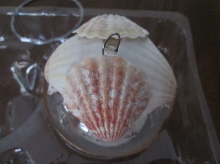 Coastal Beach Ornaments - closeup of a ornament with scallop shells glued on the outside