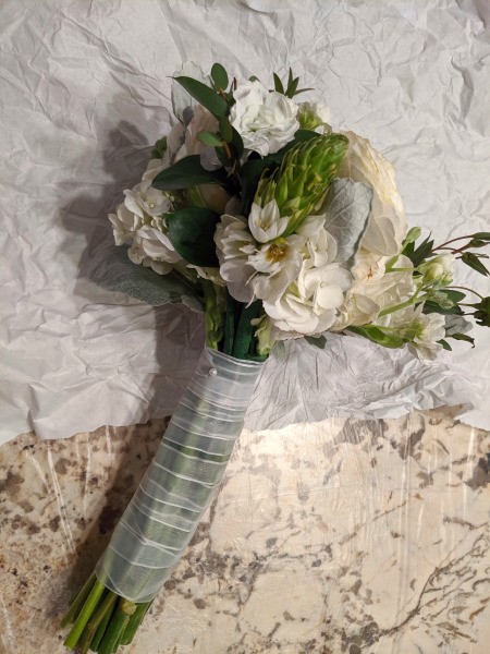 Adding Fresh Flowers to Cake Decoration - bouquet of fresh flowers