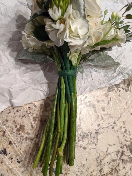 Adding Fresh Flowers to Cake Decoration - ready to separate by removing rubber band