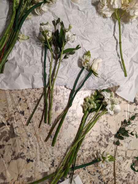 Adding Fresh Flowers to Cake Decoration - flowers divided up into small groups