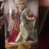 Value of a Collector's Choice Porcelain Doll - Christmas doll in the plastic box