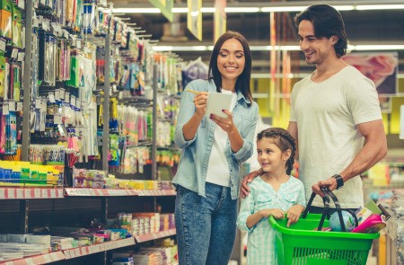 A family shopping in a supermarket.