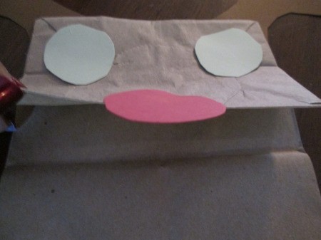 Reindeer Puppets - glue eyes and nose to the bottom fold