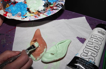 Painting the elf ears a light green.