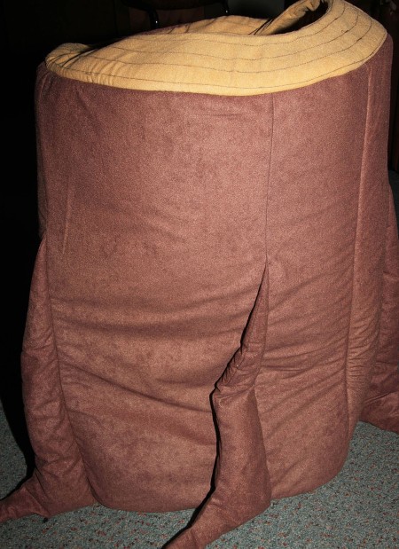 A tree trunk to cover the legs.