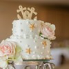 Wedding Cake with starfish on the sides and Anchors on top