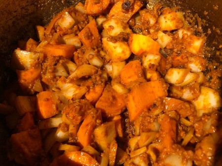 adding garlic, onions & carrots