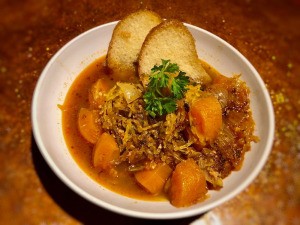 Spaghetti Squash Soup in bowl with bread