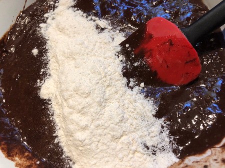 adding flour to wet ingredients