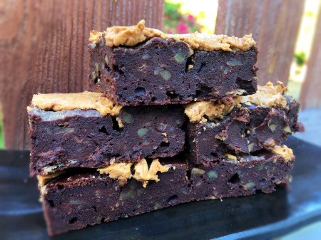 cut Fudgy Peanut Butter Banana Brownies on plate