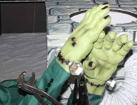 Artificial hands and pliers.