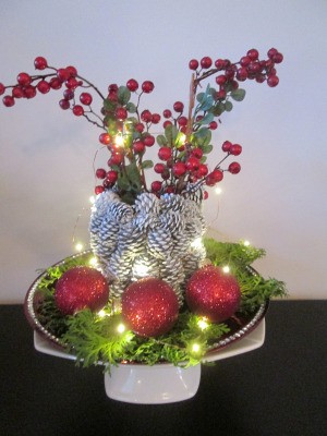 Pine Cone Vase - white pine cone vase with fairy lights turned on