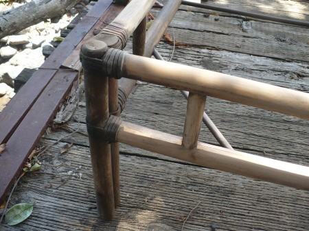 Repairing A Bamboo Coffee Table - sanding with care to protect the leather wrappings