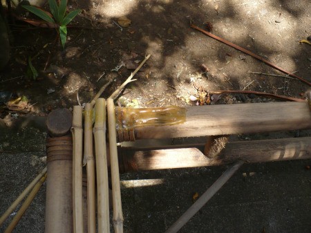 Repairing A Bamboo Coffee Table - glue down the cut pieces of bamboo