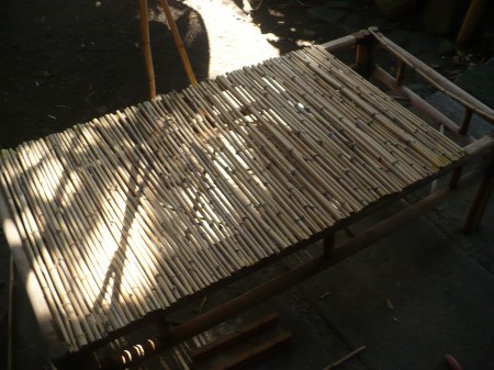 Repairing A Bamboo Coffee Table - finish glueing down the bamboo and allow to completely dry