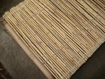 Repairing A Bamboo Coffee Table - two lines of wrap down the center of the table half