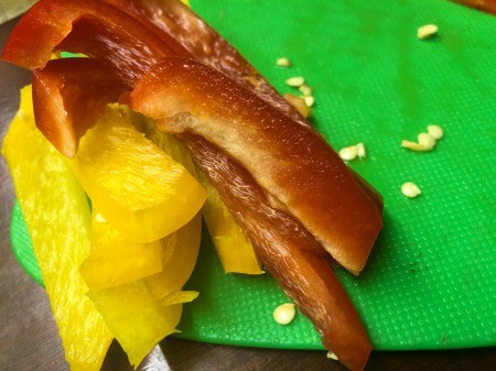 Thanksgiving Turkey Veggie Tray - cut the rest of the red and the yellow pepper into strips, save two seeds for eyes