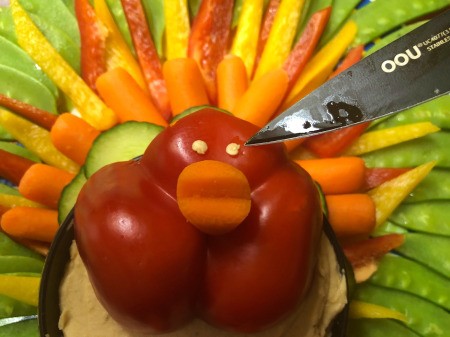 Thanksgiving Turkey Veggie Tray - use a tiny dab of hummus to attach the seed eyes