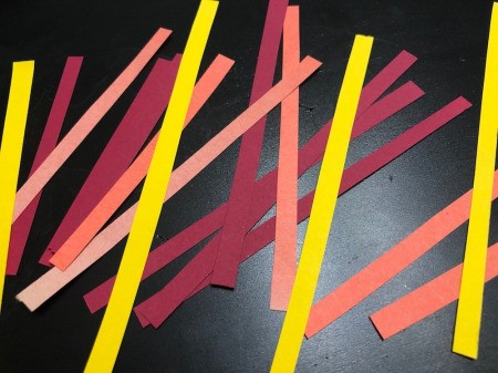 3D Funny Turkey Card - cut short, medium, and long pieces of craft paper in red, yellow, and orange