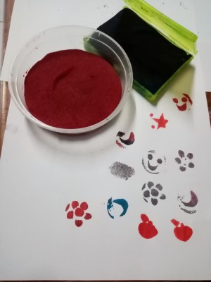 Making A Stamp Pad at Home -pad and paper with stamped images