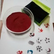 Making A Stamp Pad at Home -pad and paper with stamped images