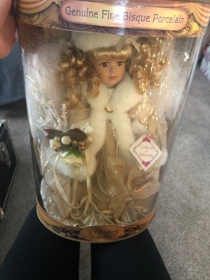 Identifying Porcelain Dolls - blonde doll in the plastic box