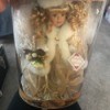 Identifying Porcelain Dolls - blonde doll in the plastic box