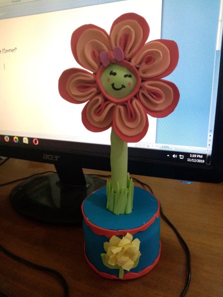 Flower Foam Pen Case and Stand - happy flower in front of a computer screen