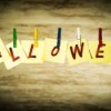 A Halloween banner made from paper and clothespins.