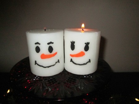 Designing Two For One - snow people candles with the snowwoman lit