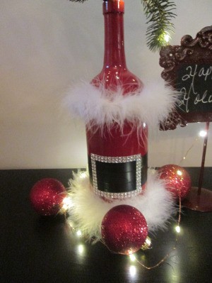 Santa Vase And Lamp - vase surrounded by red ornaments and fairy lights