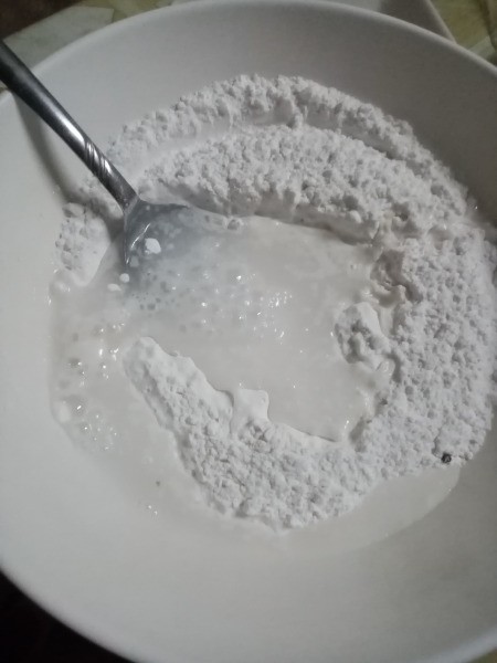 adding water to flour