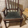 Identifying Antique Chairs - old arm chair with decorative routing, and a leather(?) seat
