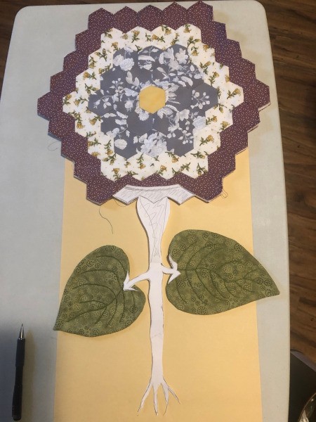 English Paper Pieced Flower Pillow - check fitting the flower and leaves on the sketch and template