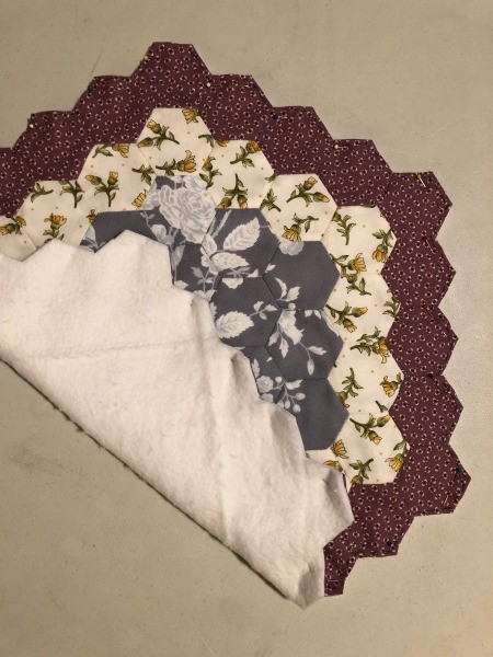 English Paper Pieced Flower Pillow - flower edge folded up to show batting