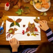 An owl craft made from fall leaves.