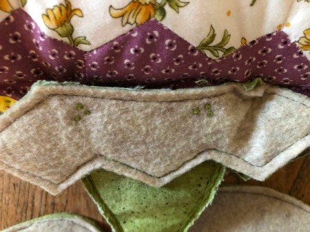 English Paper Pieced Flower Pillow - closeup of the back stem crown