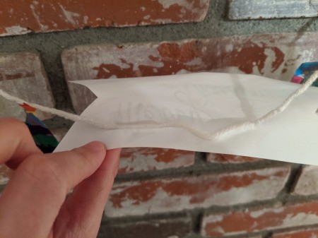 Christmas Tree Banner - attaching Merry Christmas banner