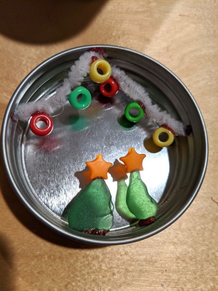 Mason Jar Lid Christmas Ornament - glue sea glass and star toppers in place