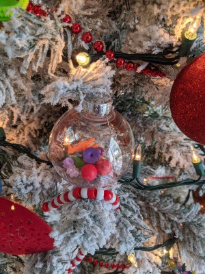 Quick and Sentimental Ornaments - clear plastic ornament with beads inside hanging on the tree