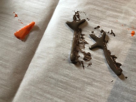 Melted Snowman Ornament - arms painted brown and nose is orange