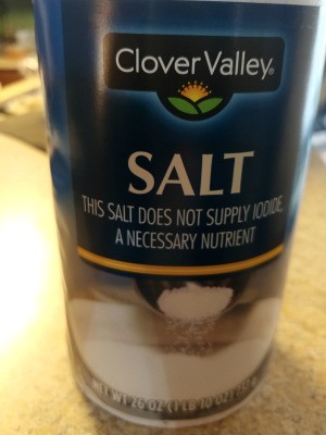 Salt for Removing Blood from Clothing - container of salt