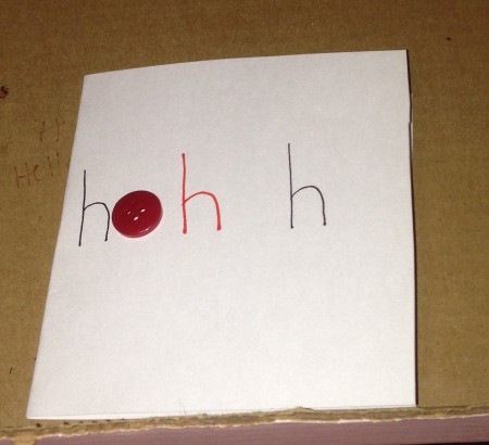 Button Christmas Cards - "h"s written across the front of the card, add a button for the "o"