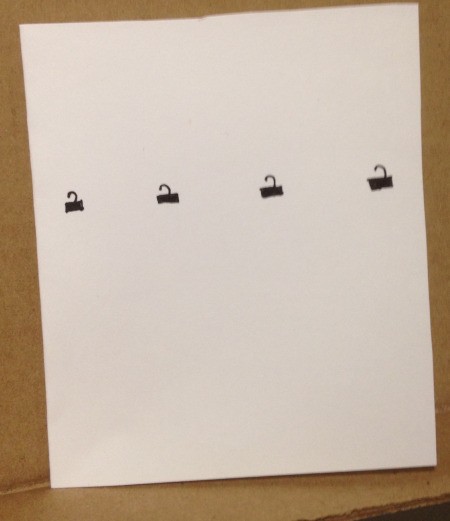 Button Christmas Cards - four ornament hooks drawn across the front of the card