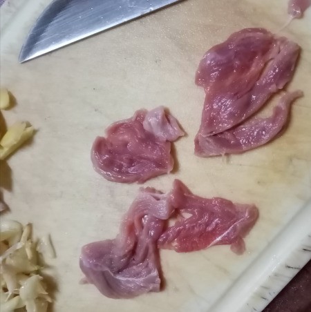 raw pork sliced thin