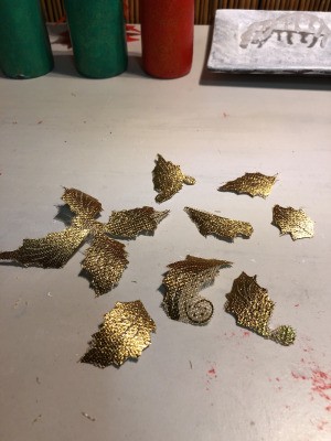 Using A Large Piece Of Tile To Make Craft Cleanup Easy - gold painted leaves on a piece of white tile