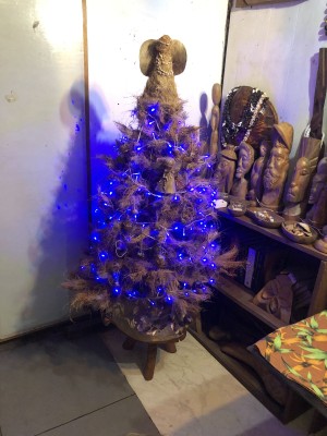 Coconut Fiber Christmas Tree - finished tree with angel and blue lights