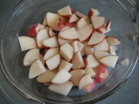cut potatoes in bowl