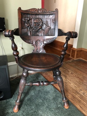 Identifying a Wooden Chair -carved back wooden chair with a round seat and turned legs