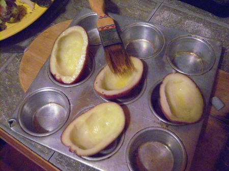 brushing potato with oil